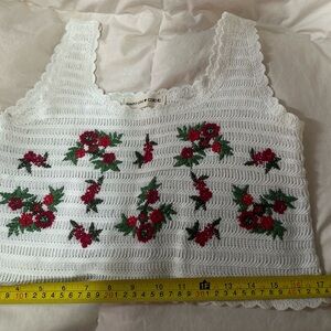 Chic White Crochet Crop Top with Red Floral Design